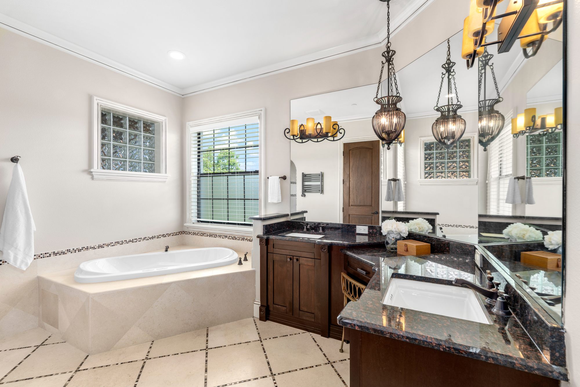 The second primary suite's bath, with a Jacuzzi soaking tub